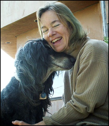 Penelope Smith hugging Buddha Boy Afghan hound